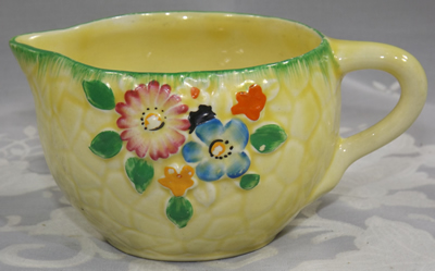 Crown Devon cream 2 piece juicer decorated with purple and bjue flowers jug