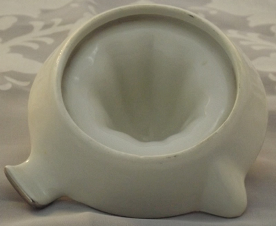 Bottom view Small juicer with silver highlights