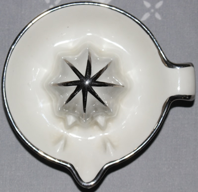 Top view Small juicer with silver highlights