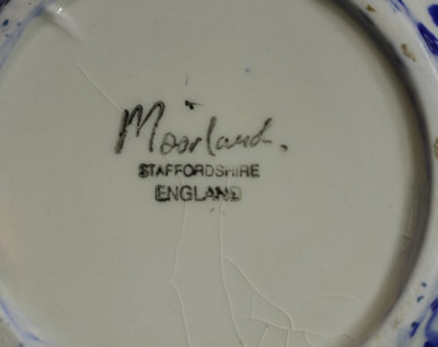 A different base of Mooreland blue & white juicer 