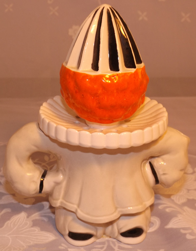 Clown with orange hair juiccer back