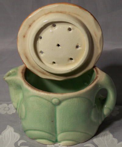 Green, white & orange clown juicer opened