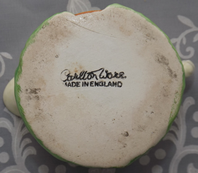 The base of a white Carlton Ware cottage juicer jug