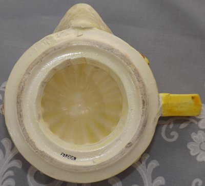 Cream and yellow bee juicer bottom view