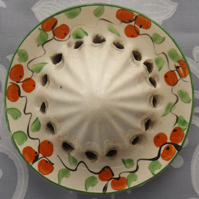 Reamer for a Sylvan Ware 2 piece juicer with small oranges pattern