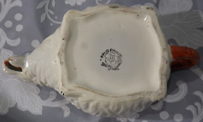 White & red dog juicer base