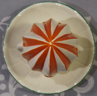Orange, green and black clown reamer