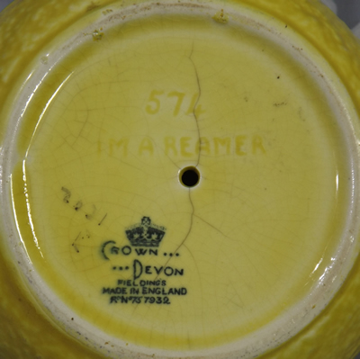 Large yellow Crown Devon 1 piece juicer base
