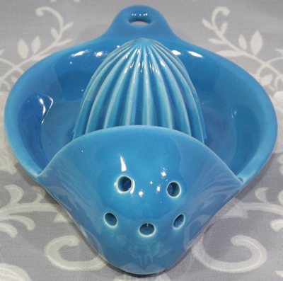 Strainer on blue Goebel juicer