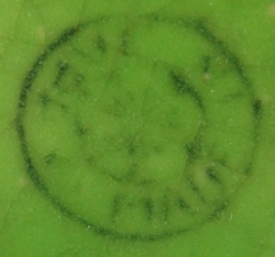 Green clown with blue vest juicer base mark