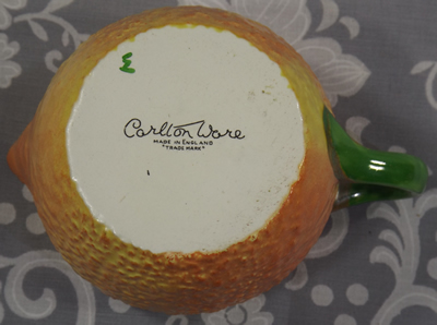 Base of Unusual shades of orange lustre Carlton Ware juicer