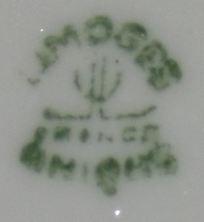 'Limoges Unique' basemark on a Limoges white and blue juicer with skier and car 