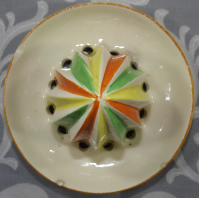 The reamer for an 'ORANGE JUICE' and chicks on cream jug juicer