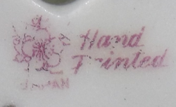 Pink basemark on a hand painted gold possibly Noritake juicer 