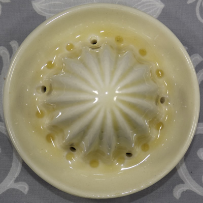 Maroon flowers on cream Royal Crownford juicer reamer