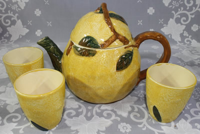 Another orange with brown leaves teapot juicer with tumblers set