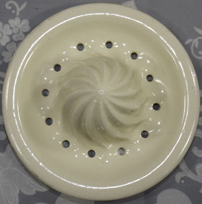 Cream with green leaves, pink and white flowers teapot reamer