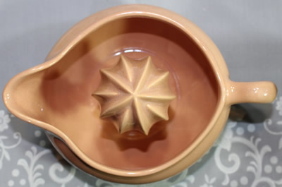 Top view of a pink 'Jiffy Juicer' juicer