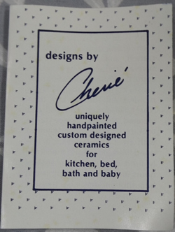 Label in A 2 piece Design By Cherie juicer