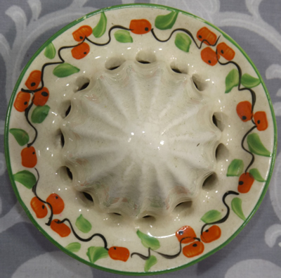 Reamer for Sylvan Ware juicer with more small oranges pattern