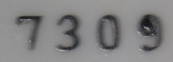 Base mark on Insects and strawberries on a white ceramic juicer