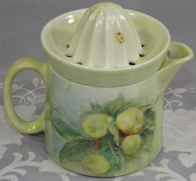 Back of the juicer showing the Handpainted peaches