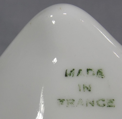 Base mark on French white saucer juicer