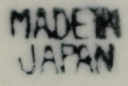 Base mark on Puddinhead with maroon hat juicer
