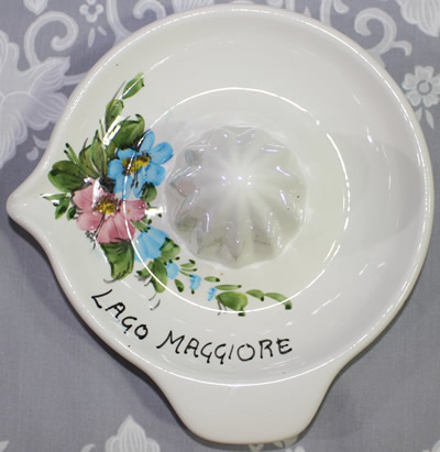 Top view of flowers and LAGO MAGGIORE juicer