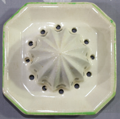 Reamer for Flowers and green trim on small white 2 piece juicer