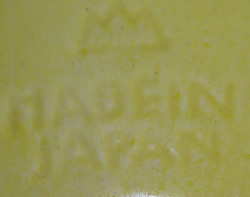 Impressed mark on 5¼" orange & white clown juicer