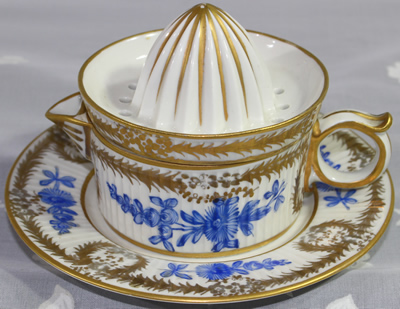 Complete set of blue and gold on white French 2 piece juicer including saucer