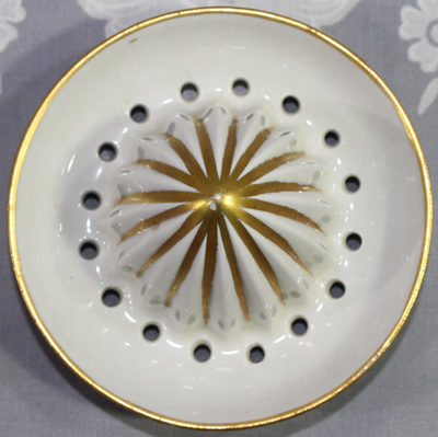 Reamer for a blue and gold on white French 2 piece juicer