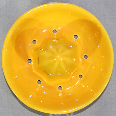 The reamer for a lemons on a Toni Raymond Pottery juicer