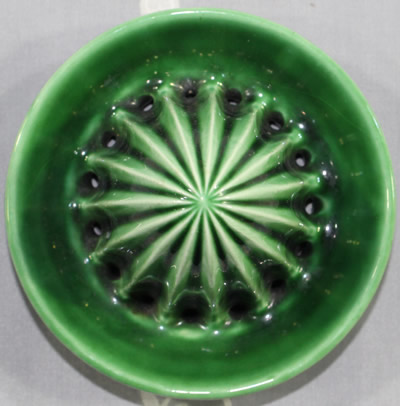 The reamer for a green 'teapot' Goebel juicer 