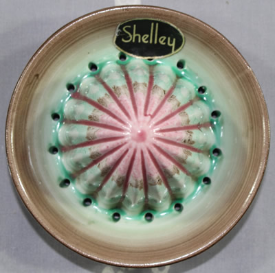 The reamer for a pink and green Shelley dripware juicer