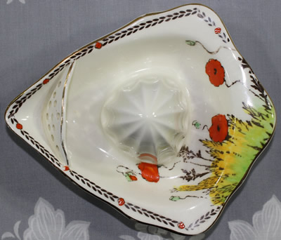 Top view of a Crown Ducal Poppy pattern juicer