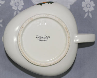 The base of a triangular Carlton Ware Tropical Fruit pattern juicer jug