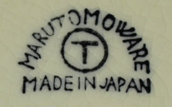 Basemark on a Marutomo green bottom ceramic swan juicer 