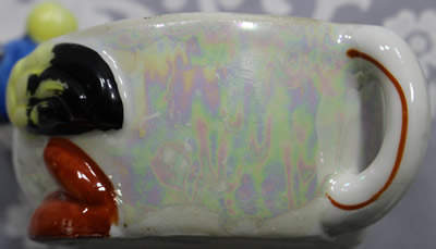 The reamer for a blue head on a yellow and blue lustre duck ceramic juicer