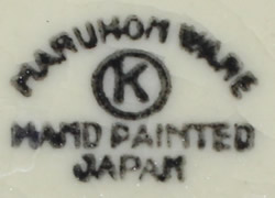 The Maruhon Ware basemark on a floral arrangement on a Maruhon Ware 2 piece juicer 