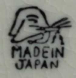 The Tashiro Shoten Ltd basemark on a oriental eyes clown juicer