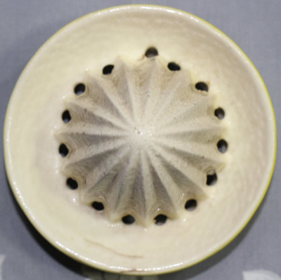 The reamer for a yellow and white 'peel' 2 piece juicer
