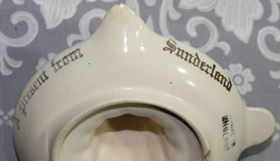 The basemarks on a present from Sunderland souvenir juicer