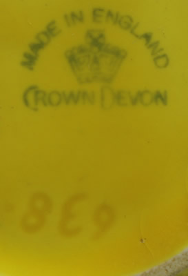 The basemark on a yellow 'peel' '638' Crown Devon juicer