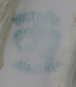 The basemark on a multicoloured flowers on a Victoria ceramic juicer