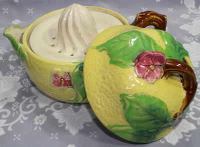 An open view of a very large 3 piece juicer with sprial reamer
