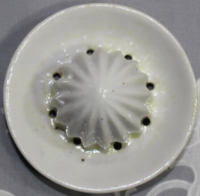 The reamer for a small lustre smiley face juicer