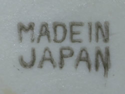 The basemark on a small lustre smiley face juicer 