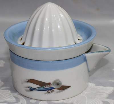 The aeroplane on a Limoges skater, parachute and aeroplane 2 piece juicer